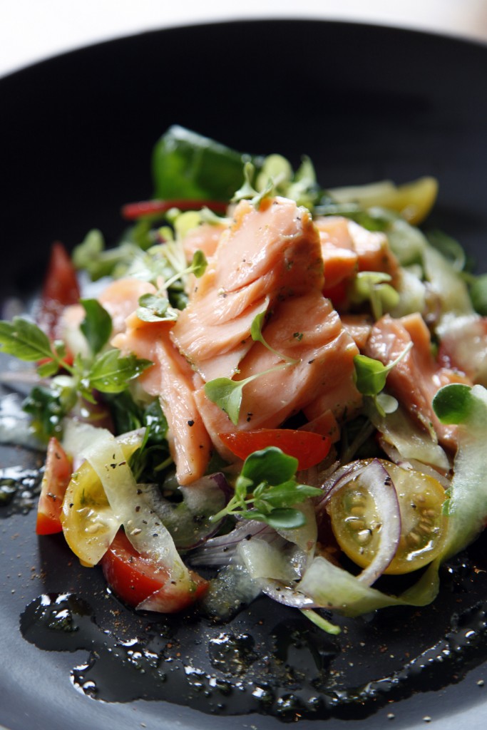 Irish Confit Salmon with tomato, onion and cucumber salad, dressed with